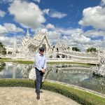 Leslie Graham, Unravel Travel TV, visits Wat Rong Khun, Chiang Rai’s White Temple in ThailandLeslie Graham, Unravel Travel TV, visits Wat Rong Khun, Chiang Rai’s White Temple in Thailand