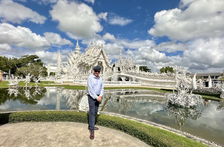 Leslie Graham, Unravel Travel TV,  visits Wat Rong Khun, Chiang Rai’s White Temple in Thailand